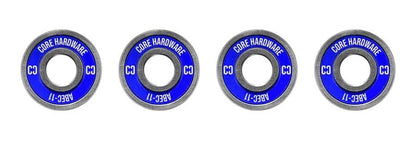 Four premium CORE ABEC 11 Scooter Bearings are arranged in a horizontal line. They feature blue centers with "CORE HARDWARE ABEC-11" printed in white along the edges, making them perfect for boosting your skateboard or scooter's performance.