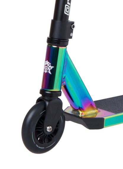 Close-up of the Revolution Lightning V2 Complete Stunt Scooter's front wheel and deck. The scooter, from the Revolution brand, features a vibrant neochrome finish with black accents on the wheel and fork. The deck is adorned with a small, geometric logo in white. Its sleek wheel showcases a modern design, enhanced by its durable chromoly steel bar.