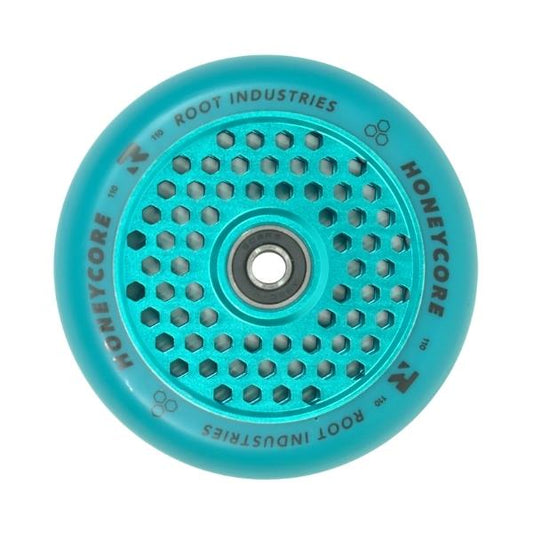 A blue Honeycore 110mm stunt scooter wheel by Root Industries, showcasing an ultra high rebound honeycomb pattern with a metal core and ABEC 11 bearings in the center. The outer edge is adorned with brand and model details in black text.