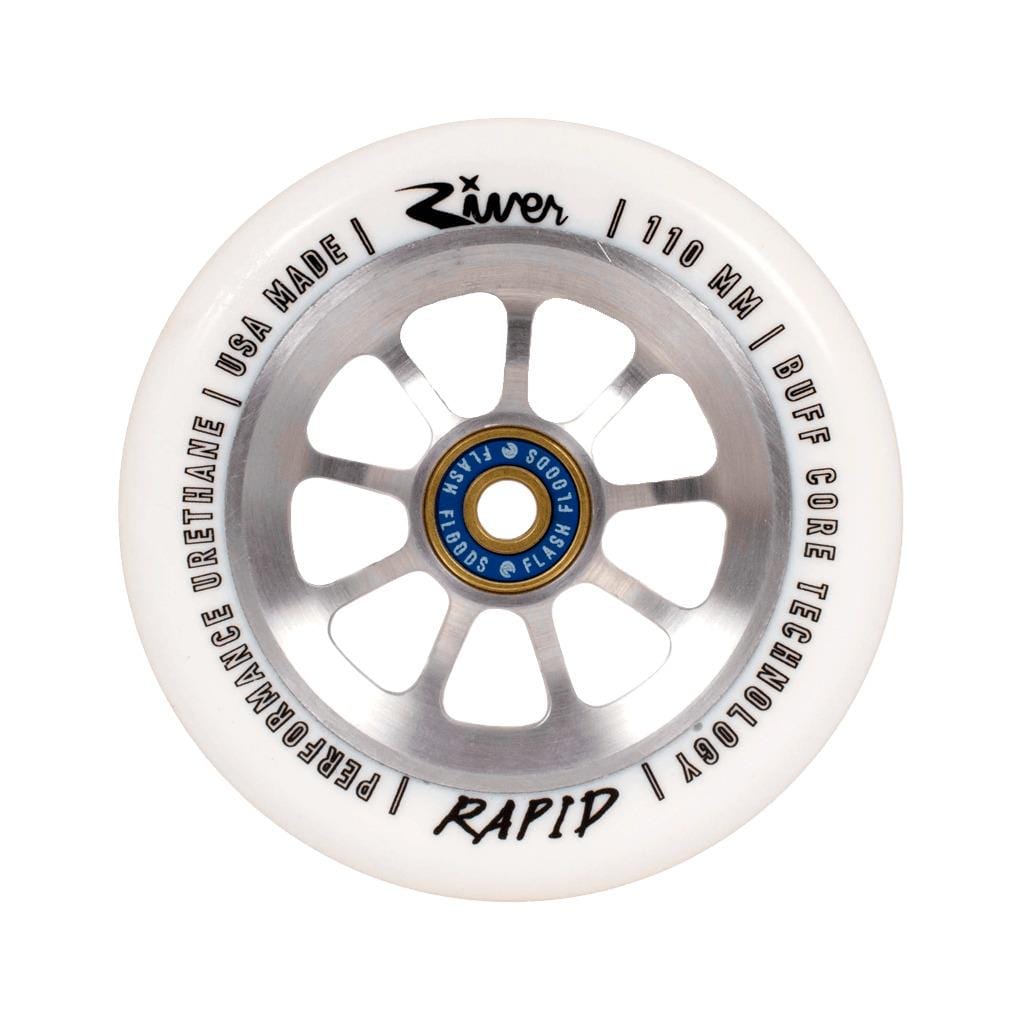 Image of a River Naturals Rapid Pro Stunt 110mm scooter wheel, Blizzard edition, engineered for speed and agility. This white wheel features a silver aluminum core with six spokes and a blue central hub. It bears the text "River," "110 MM," "Made in USA," along with other specifications, and is equipped with River Flash Flood Bearings ideal for pro stunt scooter wheels.