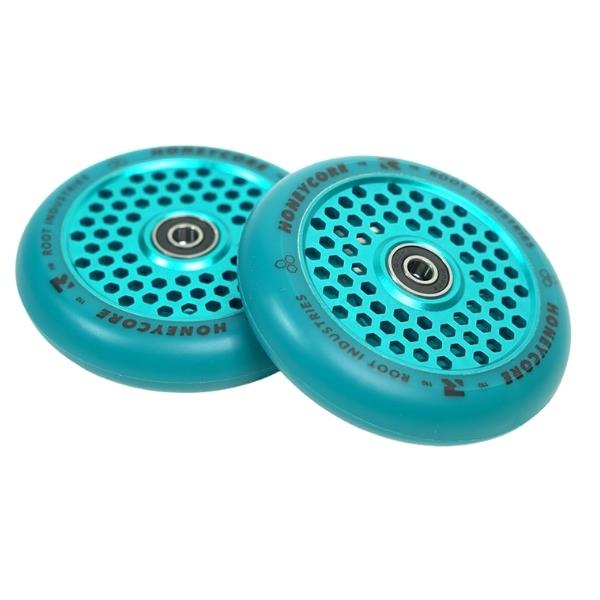 Two blue Root Industries Honeycore 110mm stunt scooter wheels showcase an eye-catching honeycomb design and sleek black ABEC 11 bearings, perfectly crafted for your pro scooter.