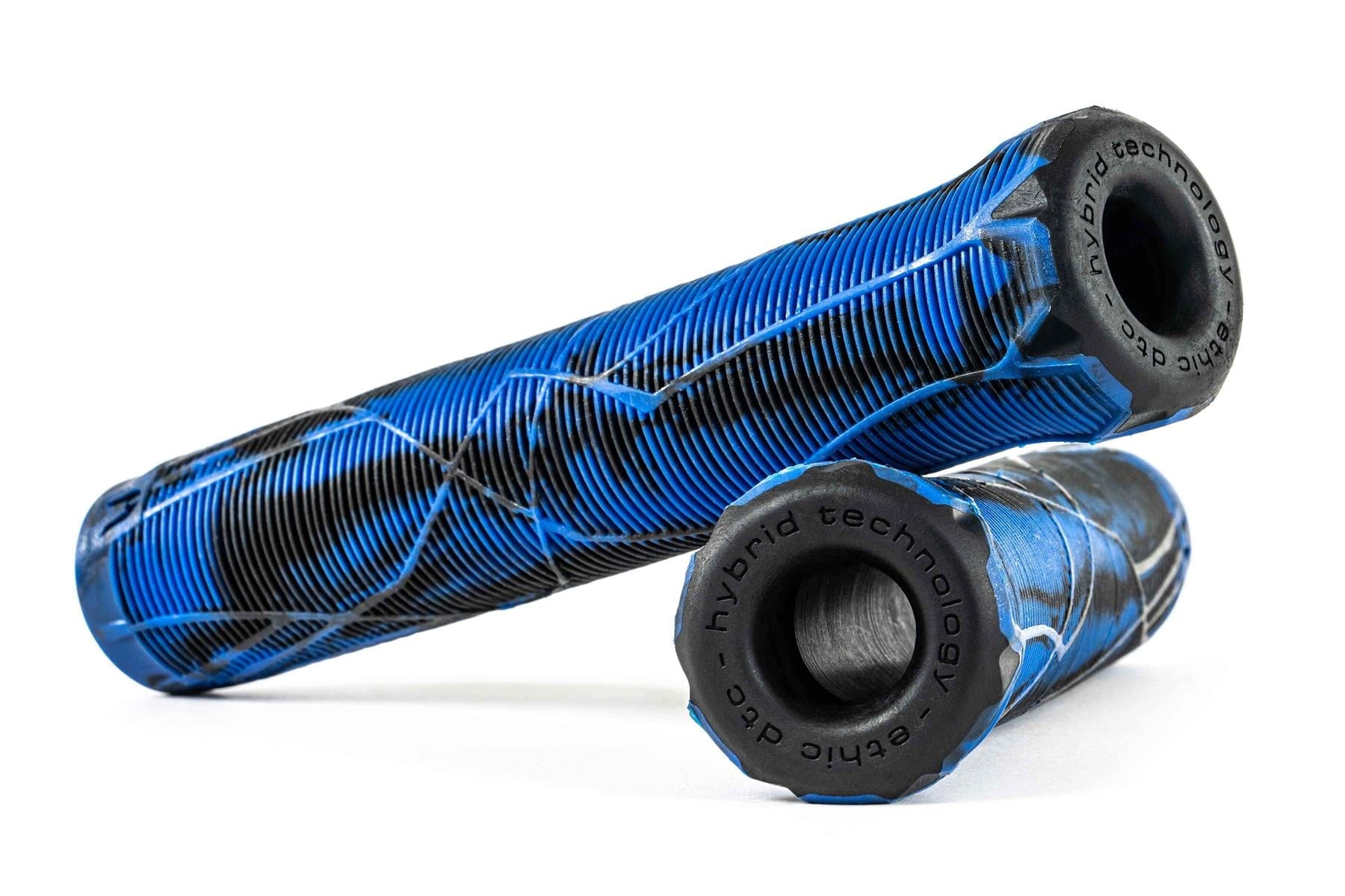 The Ethic Slim Blue/Black Stunt Scooter Grips - 160mm, by Ethic, are shown crossed against a white background. Boasting a sleek, ergonomic textured design with integrated bar ends and "hybrid technology" caps, these primarily blue grips with black accents highlight their stylish and functional features.