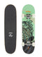 Two Arbor Seed Woodcut Green Complete Skateboards: one flipped to reveal a green underside with a black and white cat design, the other showcasing a black grip tape top displaying the white Arbor logo. Crafted from sustainable Canadian Maple, these boards feature intricate details and contrasting colors, making them ideal for youth or beginner skateboarders.