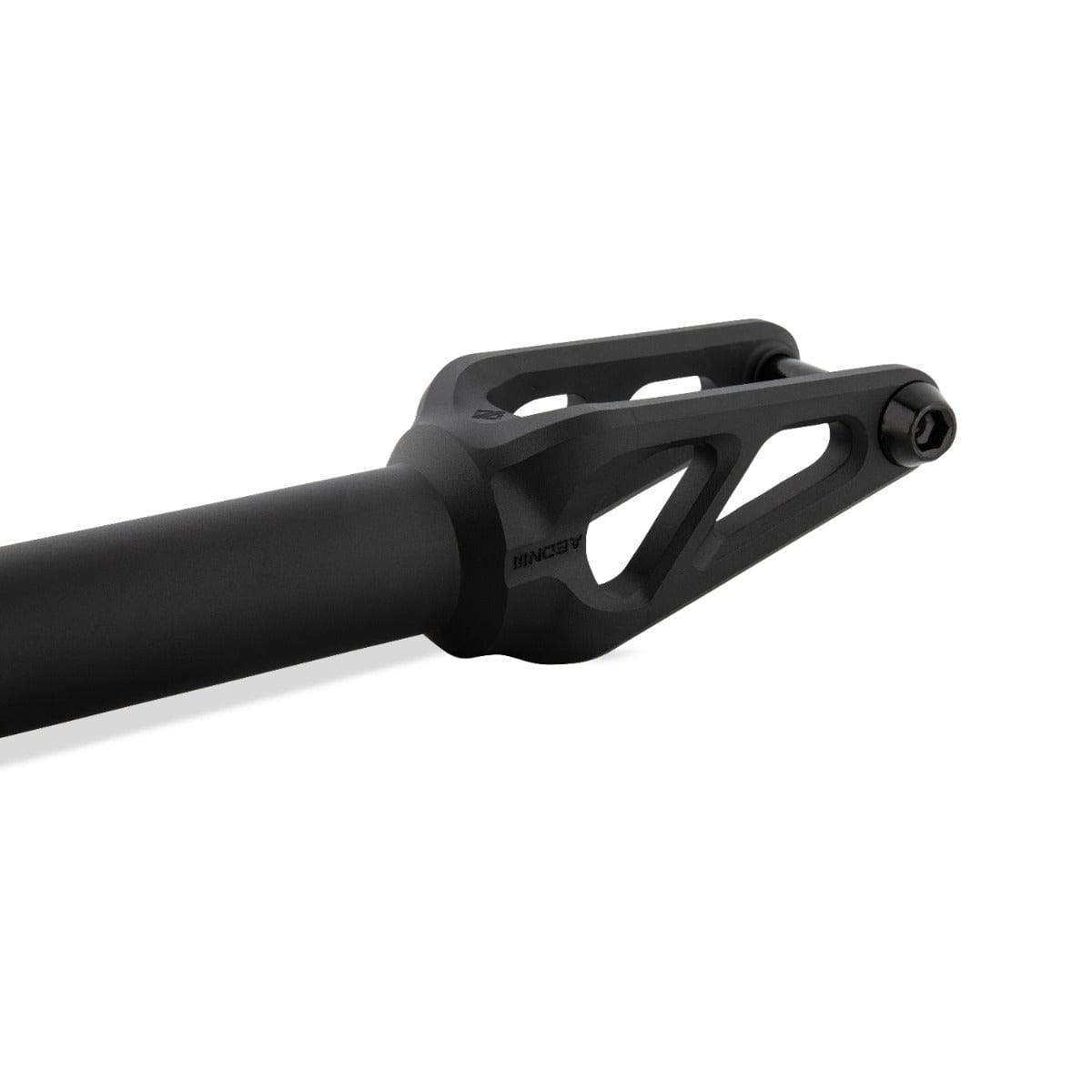 The close-up features a component from the Drone Aeon 3 Feather-Light IHC Stunt Scooter Forks in black, showcasing a cylindrical design with an angular bracket reminiscent of the Drone brand's sleek models. The bracket includes cut-out sections and is tipped with a bolt. Its smooth, matte surface suggests a lightweight construction optimized for performance.