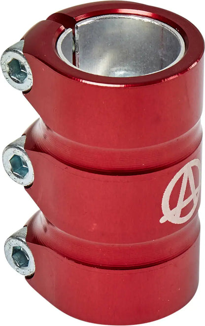 The Apex Gama 3 Bolt Oversized SCS Stunt Scooter Clamp in red, crafted by Apex, features three bolts and an engraved symbol, providing superior strength and durability for securing parts.