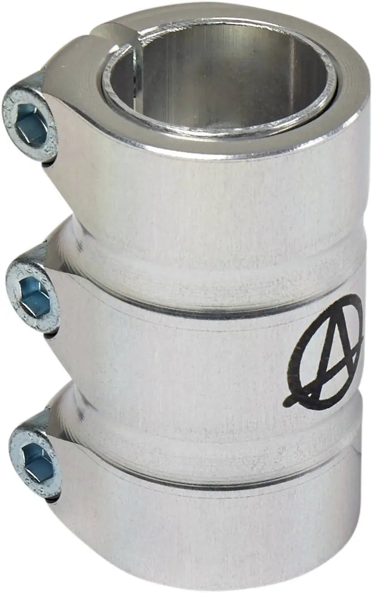 The Apex Gama 3 Bolt Oversized SCS Stunt Scooter Clamp by Apex is crafted in silver with a cylindrical design that includes three bolt screw holes for increased durability. Its distinguishing feature is a circular logo featuring an "A" etched on the side.