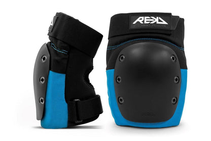 Two REKD Ramp Knee Pads in black and blue feature protective hard shells and adjustable straps for superior impact resistance. Specifically designed for action sports, these knee pads are displayed upright with the REKD logo prominently on top, ensuring both safety and style.