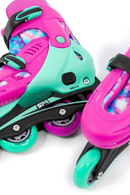 Close-up of the vibrant SFR Cyclone II Adjustable Inline Skates - Tie Dye. These rollerblades showcase pink and teal hues with tie-dye patterns on the boot liners. The teal wheels contain ABEC-5 carbon bearings, and the adjustable sizing system is prominently visible.