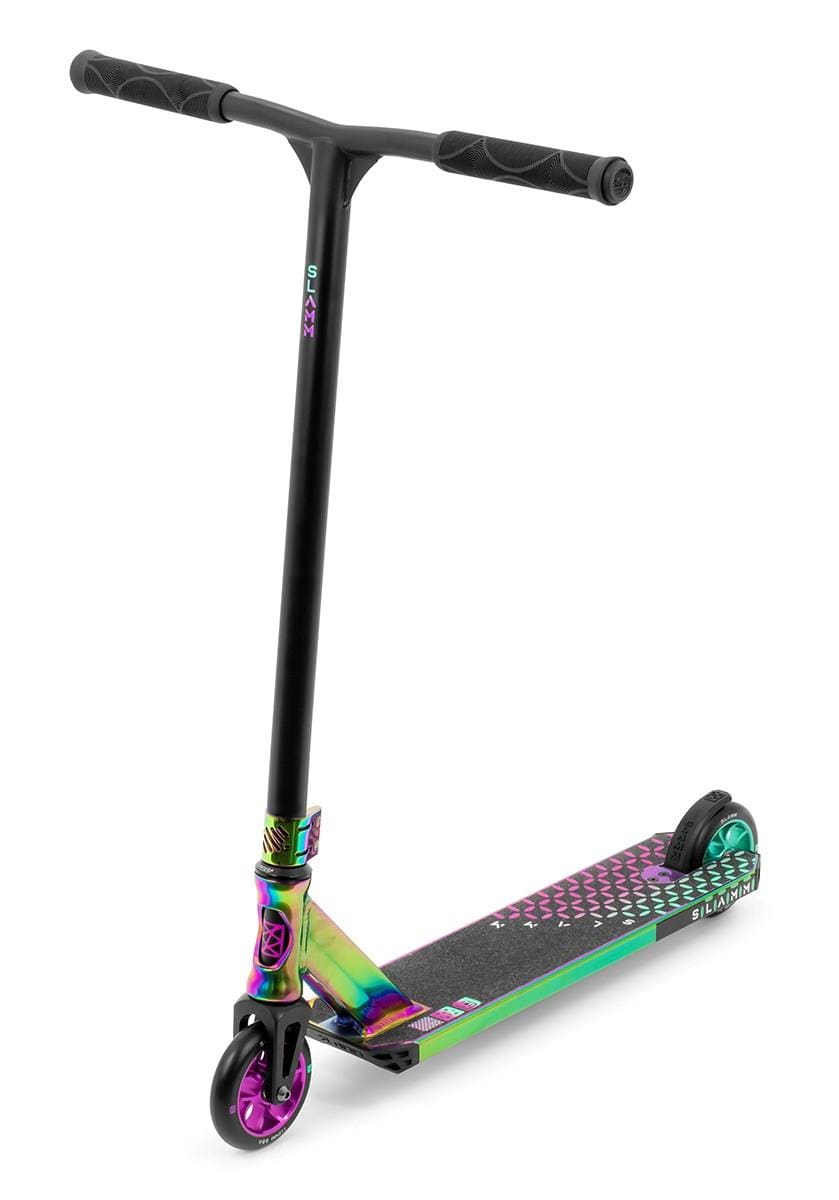 The Slamm Assault Complete Stunt Scooter - Neochrome by Slamm features a vibrant neochrome design with a black T-bar handle and an alloy deck in striking purple, green, and blue shades. The 110mm aluminium wheels complement the color scheme, and the patterned grip tape on the deck enhances its overall style.