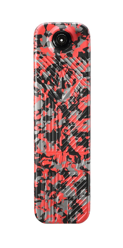 A rectangular inflatable pool float adorned with a red, black, and gray camouflage pattern. The textured surface enhances comfort, complemented by a small circular pillow at one end—ideal for lounging after an exhilarating ride on your customizable Blunt Envy TS Pro 6 Indoor Trampoline Stunt Scooter or an adventurous session.