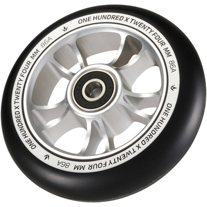 A detailed view of the Blunt Envy 100mm Stunt Scooter Wheel - Silver / Black reveals its silver spokes and black rubber outer layer, highlighting its aluminium core. The rim is inscribed with "One Hundred x Twenty Four MM 86A," and it comes equipped with ABEC 9 bearings for smooth rotation.