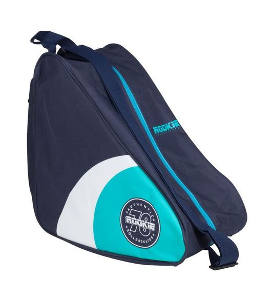 The Rookie Classic Roller Skate Bootbag - Blue showcases a dark blue design with turquoise and white accents, proudly displaying the Rookie logo. It includes an airflow system for maintaining freshness, a zippered front pocket, and an adjustable shoulder strap for convenience.