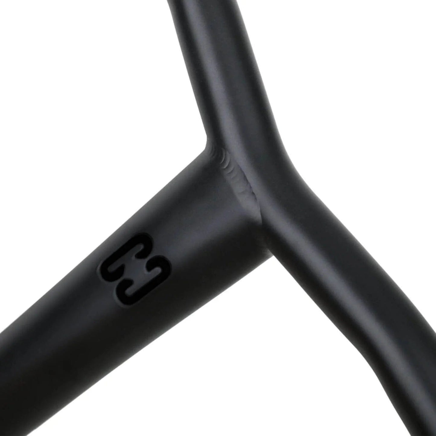 The handlebars of the CORE Apollo V2 Titanium Oversized HIC Stunt Scooter Bars feature a sleek black design with a welded junction. Displayed on the left tube is a small logo consisting of two interlocking "C" shapes, adding a touch of style. Made from titanium, these lightweight handlebars ensure enhanced durability and make a striking impression against the white background.