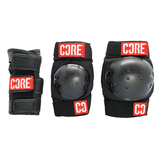 The CORE Junior Triple Skate Protection Pad Set in Black/Red includes three protective gear pieces: wrist guard, elbow pad, and knee pad. Designed by CORE, this set features red "CORE" labels and offers adjustable straps and a durable design to ensure safety during skatepark activities like skateboarding or rollerblading.