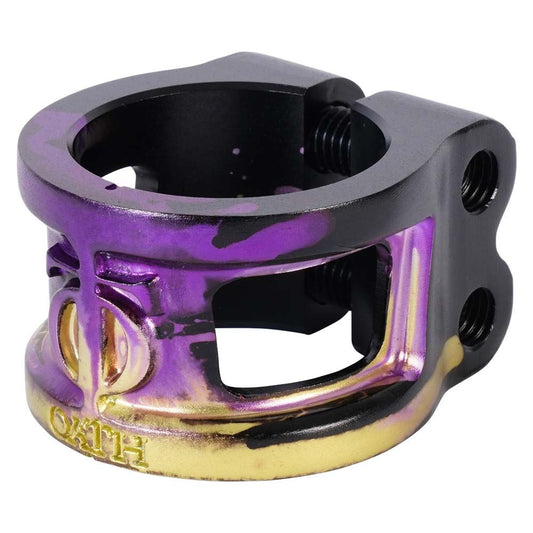 Introducing the Oath Cage V2 2 Bolt Oversized Stunt Scooter Clamp, showcasing a vibrant black, purple, and yellow finish. This lightweight clamp features a durable strength cut-out design with "Oath" engraved on it and includes bolts for secure fastening.