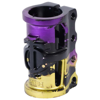 The Oath Cage V2 4 Bolt SCS Oversized Stunt Scooter Clamp is a vibrant accessory made from 6061 T6 Aluminium. It exhibits a cylindrical design with a gradient of black, purple, and yellow, adorned with splatter patterns. The clamp features multiple bolt holes and engraved details for a sleek and personalized appearance.