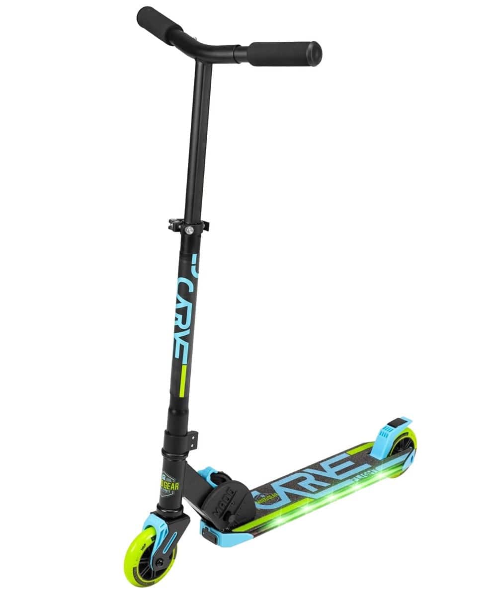 The Madd Gear MGP Carve Flight Light Up Foldable Scooter in blue and lime features a sleek design with "CORE" emblazoned on the stem and footboard. This folding kick scooter comes in black and blue, showcasing neon green wheels, and includes a small footbrake over the rear wheel for added control.