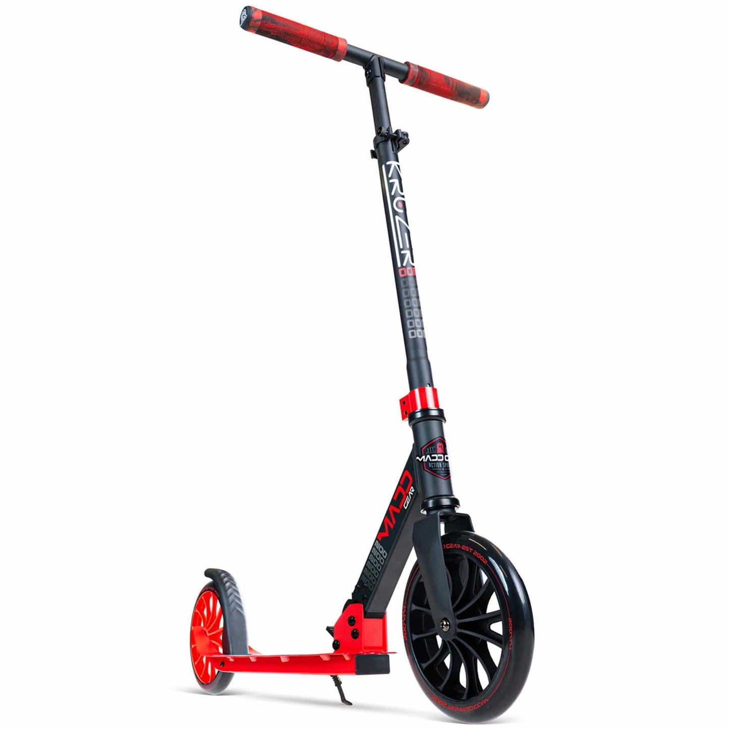 Introducing the Madd Gear MGP Carve Kruzer V2-200 Commuter Foldable Scooter in Black and Red. This scooter boasts a durable frame and rubber handlebars, complete with large wheels, a convenient kickstand, and sleek "MADD" branding on the deck. Its modern design makes it an ideal choice for urban travel.