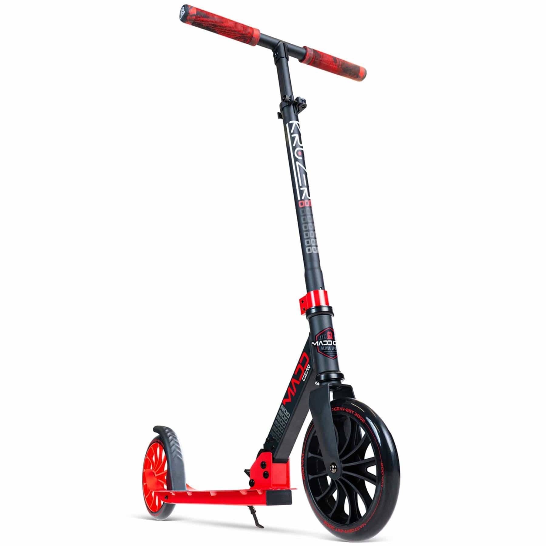 Introducing the Madd Gear MGP Carve Kruzer V2-200 Commuter Foldable Scooter in Black and Red. This scooter boasts a durable frame and rubber handlebars, complete with large wheels, a convenient kickstand, and sleek "MADD" branding on the deck. Its modern design makes it an ideal choice for urban travel.