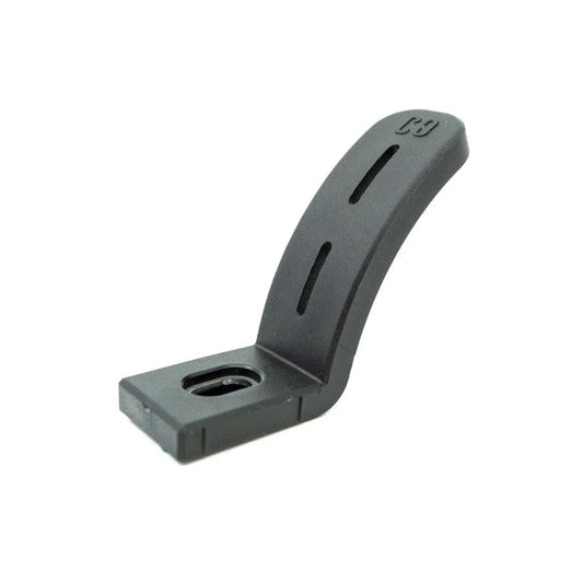 A black CORE Dual Nylon Stunt Scooter Brake, made of plastic and featuring holes, assures improved braking performance.