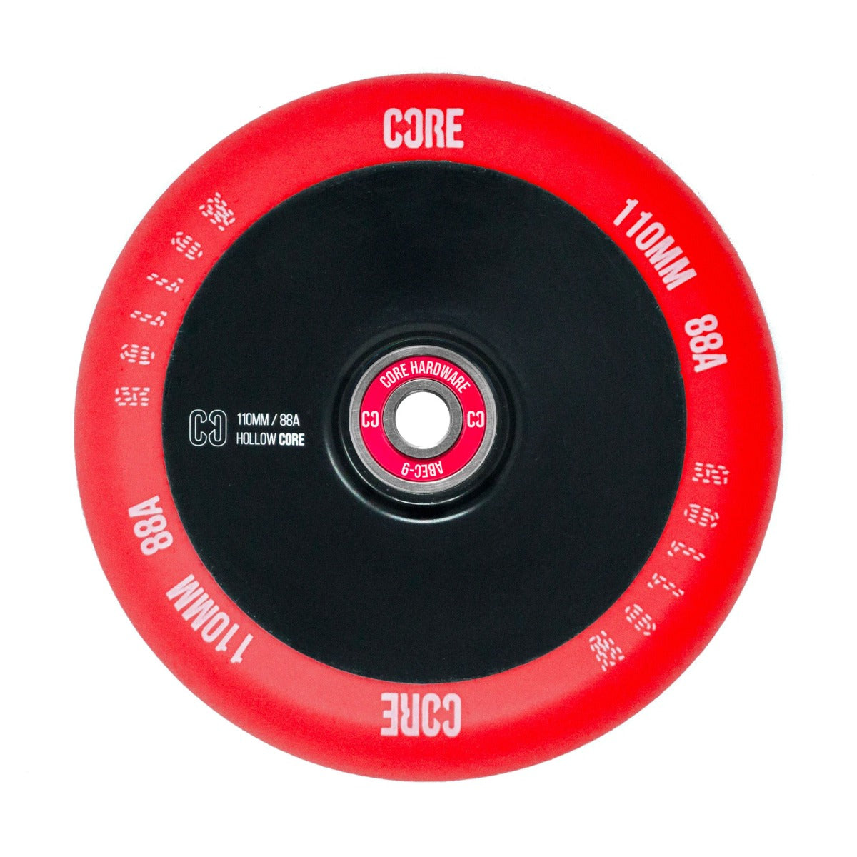 Introducing the CORE Hollow Core V2 110mm Stunt Scooter Wheel in red and black, featuring a distinctive hollow core design proudly displaying the "CORE" branding. It includes "110MM / 88A" markings, white text around the edge, a central graphic, and ABEC-9 bearings to ensure smooth performance.