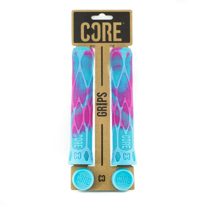 Introducing the CORE Pro Refresher Blue / Pink Stunt Scooter Grips, measuring 170mm. These vibrant blue and pink grips for handlebars are crafted with a shock-absorbing compound and come mounted on a cardboard backing featuring the CORE logo and "GRIPS." Each end cap displays the iconic CORE emblem.