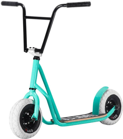 The Rocker Rolla Big Wheel Complete Scooter - Teal by Rocker showcases a stylish teal and black design with striking large white wheels and a wooden foot deck. Its robust black handlebars with end grips make it an ideal choice for those who value the nimbleness of stunt scooters.