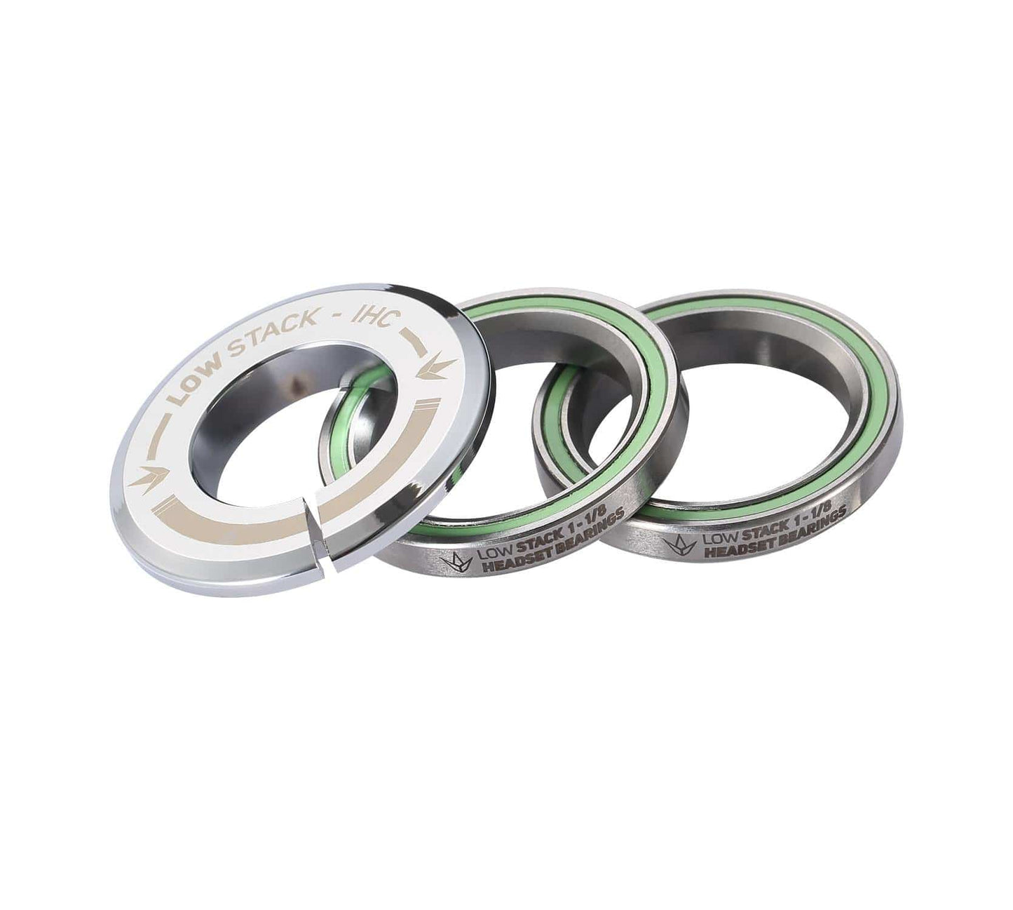 Three chrome mechanical components with green inner rings, labeled "Blunt Envy Low Stack IHC," are aligned in a row to highlight various angles. Designed for an integrated stunt scooter headset, these pieces feature the IHC compression system with sealed bearings for smooth performance.