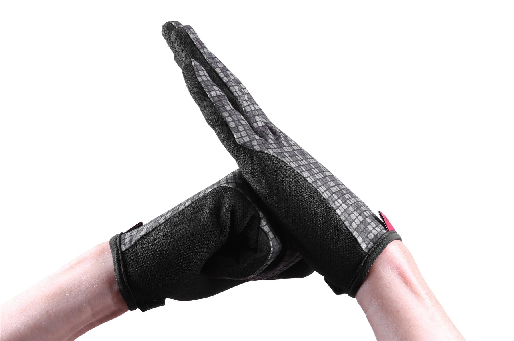 A person wearing GAIN Protection Resistance Skate Gloves - Logo, in black and gray with a checkered pattern made from durable ARMORTEX fabric, performs a high-five gesture against a white background.