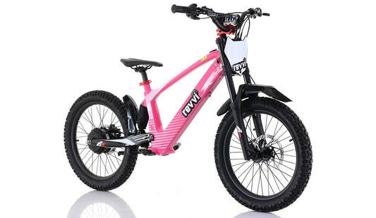 The Revvi 20" Kids Electric Balance Bike - Pink has a black seat, handlebars, tires, and kickstand. It features a front suspension fork and adjustable speed settings for its electric motor. The "Revvi" brand is displayed on its sturdy frame.