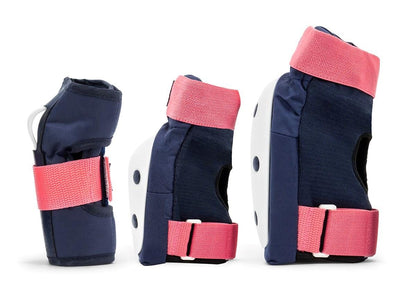 The REKD Heavy Duty Triple Skate Protection Pad Set - Blue / Pink, produced by REKD, includes navy blue wrist guards with bright pink straps. Displayed from the side, these guards showcase a durable construction featuring white plastic elements to enhance support and safety.