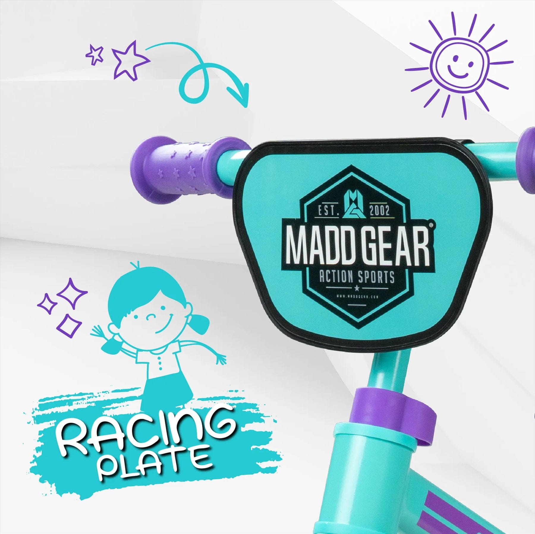 Close-up of Madd Gear's My 1st BMX Balance Bike in teal and purple, ideal for ages 18 months to 4 years. It features a racing plate with cartoon graphics of a smiling girl, stars, an arrow, and a sun.