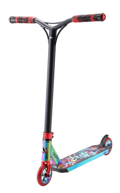 The Sacrifice Flyte 115 V2 is a complete stunt scooter from the brand Sacrifice, showcasing a vibrant neochrome and red graffiti design. It features a striking deck with abstract graphics, accompanied by a black handlebar and red grips. Its bold color scheme is finished with matching red wheels and a front fork.