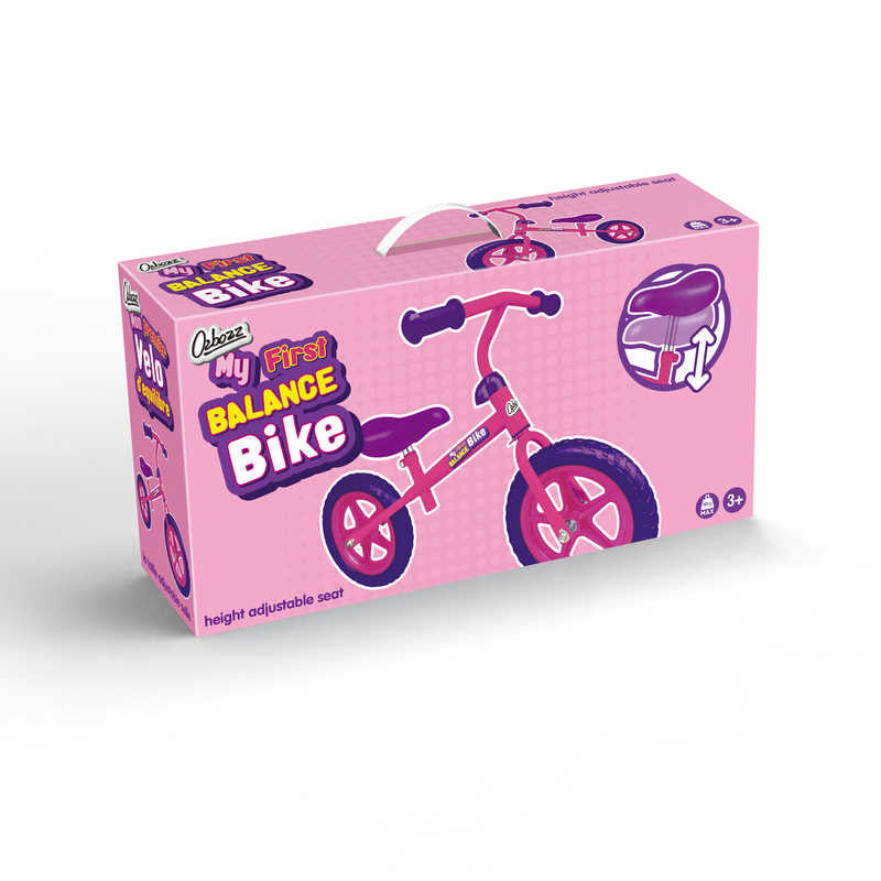 The packaging for the "Ozbozz My First Balance Bike - Pink / Purple" features an image of a pink bike with black handlebars and wheels, alongside puncture-proof tyres. An illustration also highlights the adjustable seat, making it suitable for children aged 3 and up.