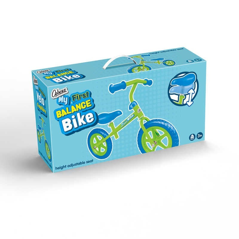 The Ozbozz My First Balance Bike - Green / Blue packaging displays a delightful illustration of the bike paired with a helmet. Prominently featured on the box is "My First Balance Bike," designed for children aged 3 and above, complete with an adjustable seat to accommodate your growing child.