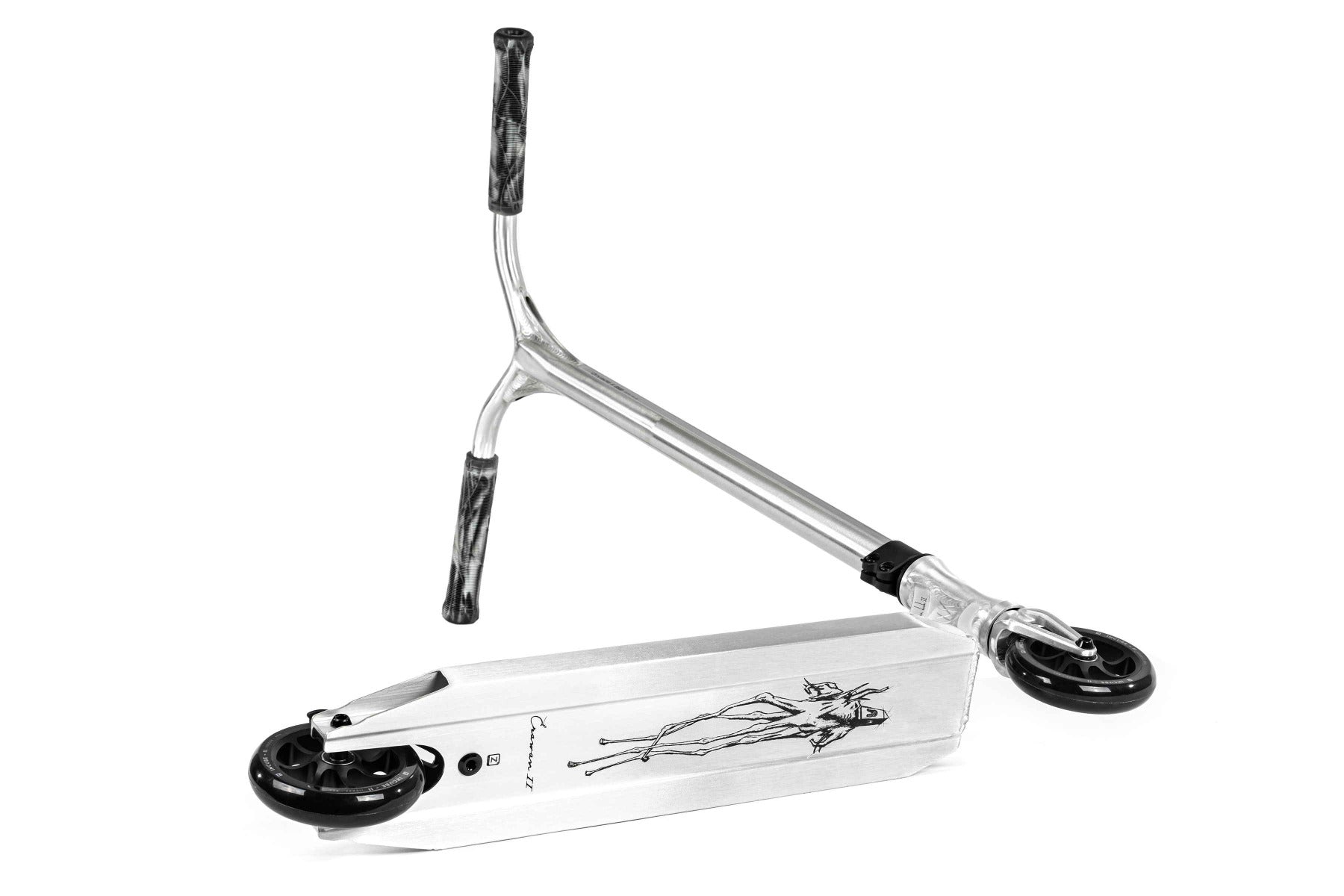 The Ethic DTC Erawan V2 Complete Stunt Scooter (M) - Brushed Silver is displayed on its side, featuring black wheels and a deck adorned with an artistic illustration of a thin figure. The black and silver handlebars have a distinctive, curved design, equipped with IHC compression for smooth performance.