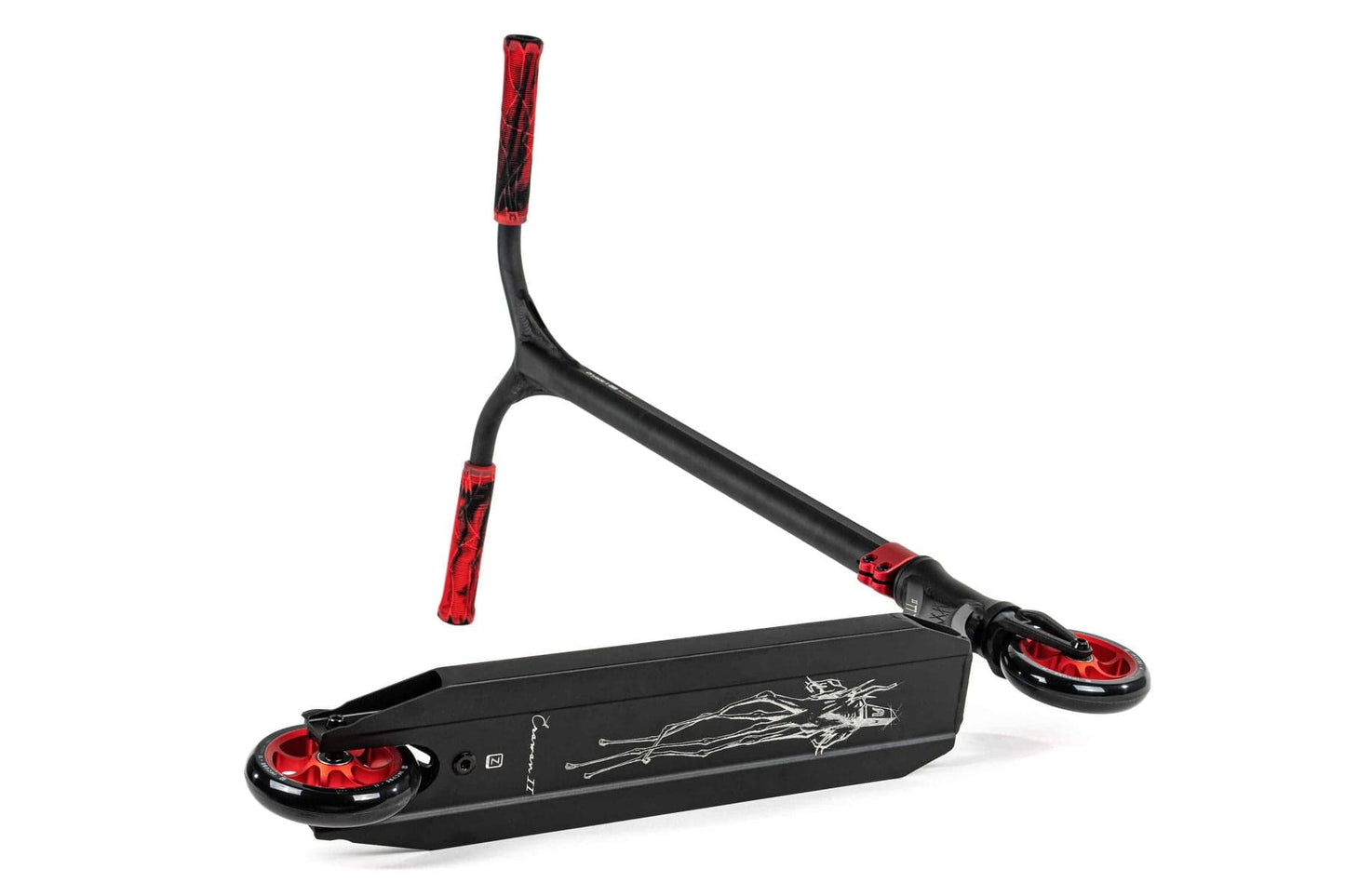 The Ethic DTC Erawan V2 Complete Stunt Scooter (M) - Red is an impressive stunt scooter featuring bold black and red highlights. When disassembled for close inspection, its deck reveals a graphic design and IHC compression. The handlebars have a distinctive shape, while the grips display an eye-catching red and black pattern.