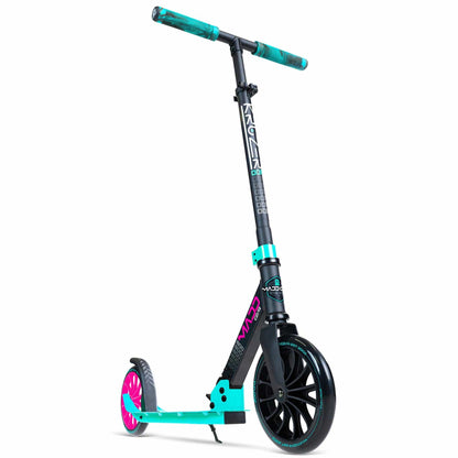 The Madd Gear MGP Carve Kruzer V2-200 Commuter Foldable Scooter in black and teal is a chic option for commuting. It boasts a textured handlebar and large wheels, along with pink accents on the rear wheel area and distinctive branding on the front post.