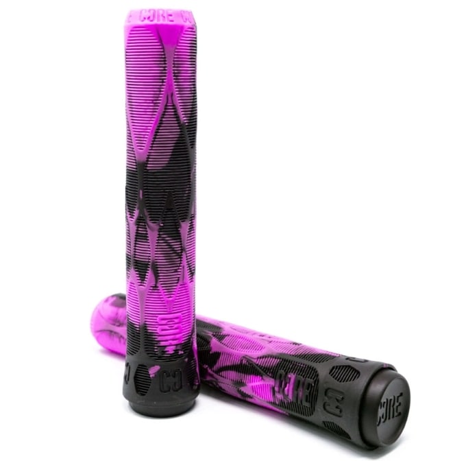 A pair of CORE Pro Fuchsia Purple / Black Stunt Scooter Grips - 170mm, offering a textured surface and impact protection. Each grip showcases the brand name "CORE" engraved at the ends. One grip remains upright while the other is positioned diagonally, making them perfect for both cycling enthusiasts and stunt scooter grips lovers.