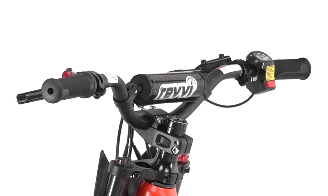 A close-up of the black handlebars on a red Revvi 18" Kids Electric Balance Bike highlights its various controls and grips. The central bar prominently features the "Revvi" logo against a plain white background, embodying innovation in children's electric balance bikes.