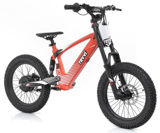 A Revvi 18" Kids Electric Balance Bike in red is showcased against a plain white backdrop, featuring rugged black tires, a suspension fork, and prominent "Revvi" branding on the frame, making it ideal for adventurous young riders.