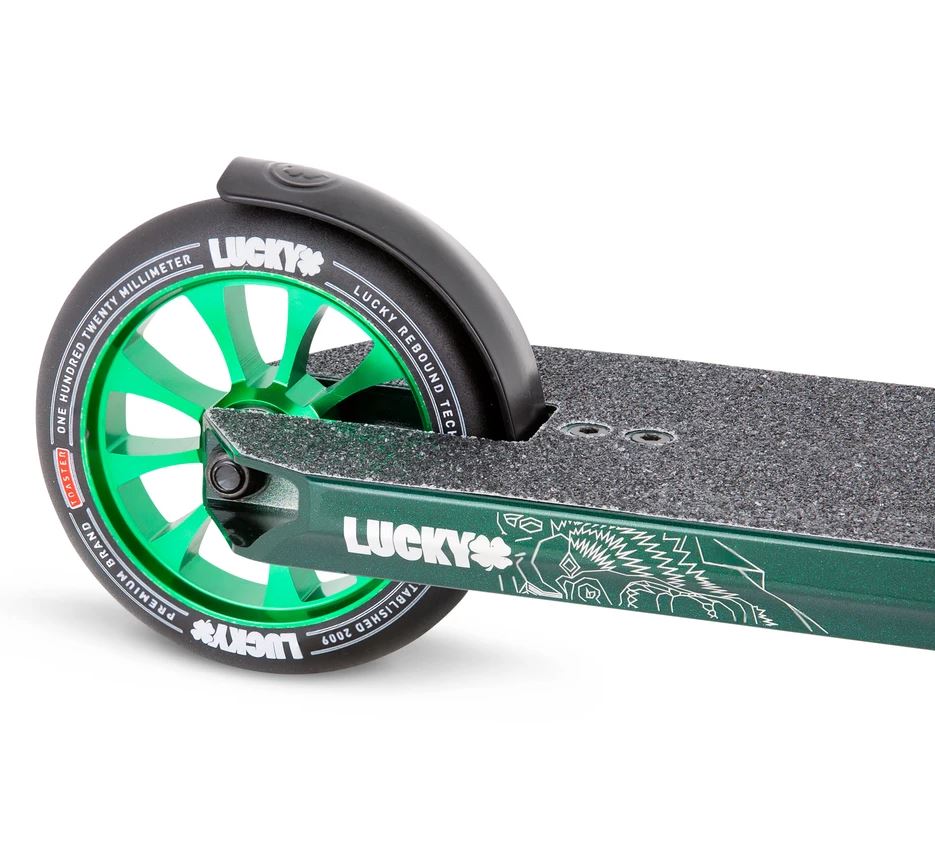 Close-up of the rear wheel of an Emerald Green Lucky Covenant 2021 Complete Stunt Scooter, showcasing the Lucky logo. The wheel features a black fender and white lettering on the tire. The deck is adorned with textured graphics, and the wheel has green spokes, making it perfect for those seeking quality aftermarket parts.