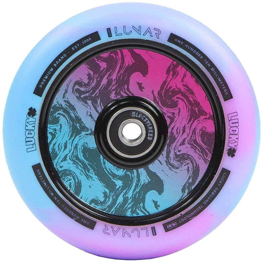 Introducing the Lucky Lunar 110mm Stunt Scooter Wheel - Rush: a vibrant scooter wheel showcasing a swirling design in pink, black, and blue. Its light blue outer rim is adorned with "Lucky Lunar" alongside decorative elements for an added touch of style.