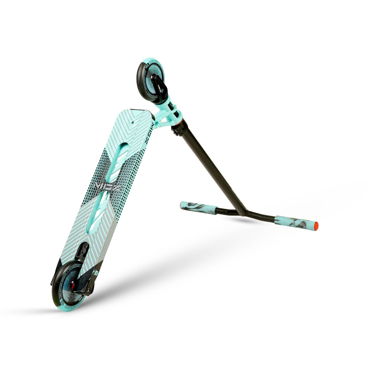 The Madd Gear MGP MGX P2 Pro Complete Stunt Scooter in Taze, presented in turquoise and black, showcases a textured deck and two small wheels. The scooter is depicted partially disassembled, with its handlebars detached and positioned parallel to the frame. Its design includes a striking geometric pattern.