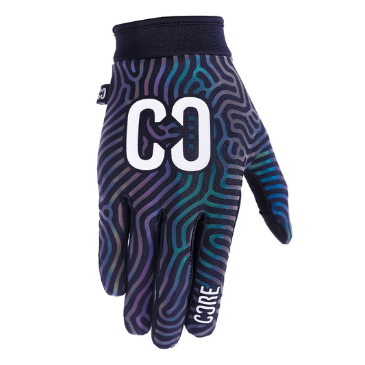 Close-up of a vibrant pair of CORE Aero Skate Protection Gloves - Neochrome Reflective, showcasing a wavy, abstract pattern in shades of purple, blue, and black. The letters "CO" are prominently printed in white on the top with "CORE" on the index finger. This touch screen friendly accessory is designed for optimal Skin Fit comfort by CORE.