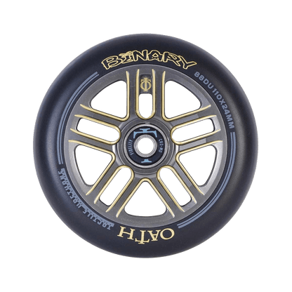 The Oath Binary 110mm Stunt Scooter Wheel in Gold and Titanium is a striking choice, with a black outer layer complemented by gold metal spokes. Adorned with the words "BINARY" and "OATH," it features dimensions of 88DU 110x24mm on the side. Designed for durability, its detailed craftsmanship and central logo elevate its style while boosting impact resistance.