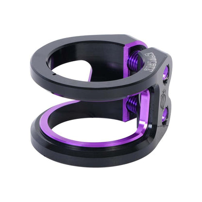 Presenting the Oath Carcass 2 Bolt Oversized Stunt Scooter Clamp, a lightweight clamp crafted from robust 6061 T6 Aluminium. This stylish black and purple double clamp showcases an open design with secure hex bolt fastenings, delivering exceptional performance without sacrificing style.