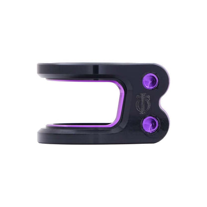 A detailed view of the Oath Carcass 2 Bolt Oversized Stunt Scooter Clamp in black and purple, highlighting two prominently displayed bolts. Made from durable 6061 T6 Aluminium, this lightweight clamp for stunt scooters boasts a refined polished finish with the Oath logo tastefully engraved on the side.