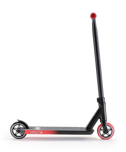 The Blunt Envy ONE S3 Complete Stunt Scooter - Black / Red is a stylish black and red scooter by Blunt Envy, ideal for beginner riders. It boasts a long handlebar and textured deck for enhanced grip, complemented by an eye-catching red front wheel and black rear wheel against a simple white backdrop.