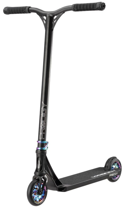 Introducing the Blunt Envy Prodigy X Complete Stunt Scooter in Black with Oil Slick Neochrome. This scooter showcases a sophisticated design, complemented by vibrant iridescent wheels and a robust deck. Its rubberized handlebars provide optimal grip, while the word "Prodigy" printed on the stem sets it apart in the world of complete scooters.